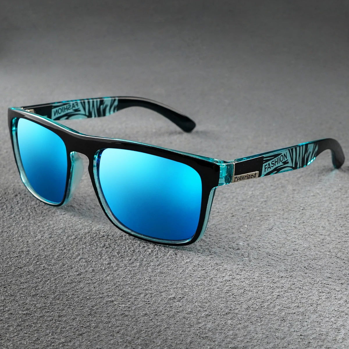 Square polarized sunglasses with blue reflective lenses, black frames, and teal patterned temples.