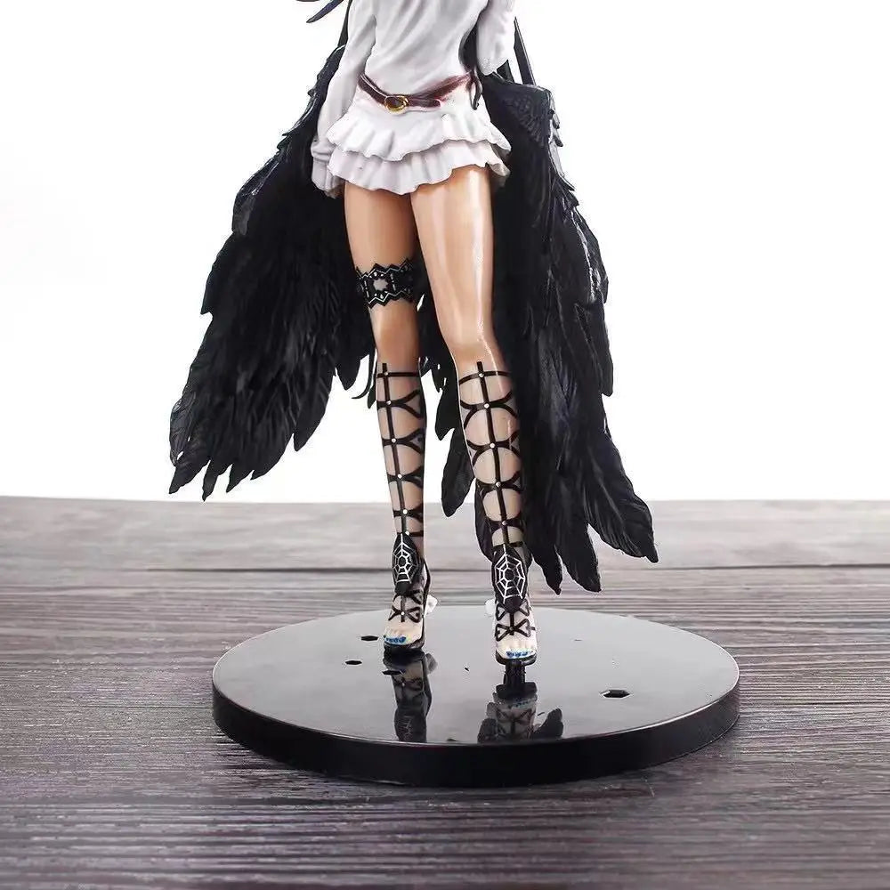 Albedo figure with white dress, black winged coat, lace-up stockings, and heels on a stand.