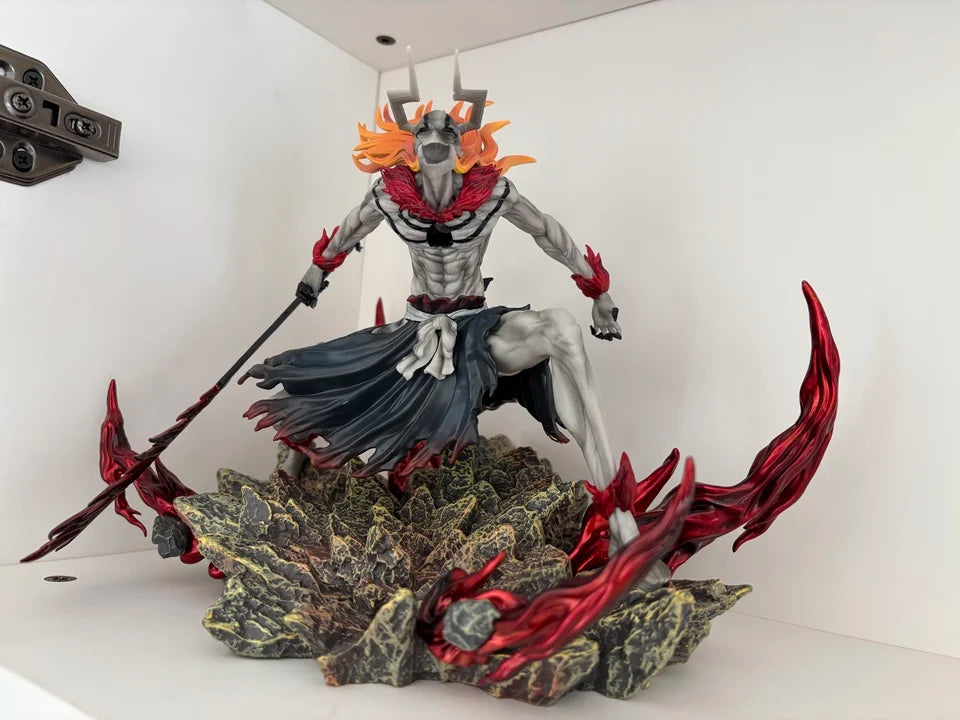 Ichigo Bull Head Form figurine crouching on a rocky, red-flamed base, holding a sword.