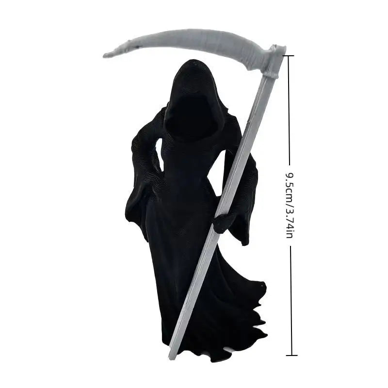 Black female Grim Reaper statue holding a large grey scythe, measuring 9.5cm tall.