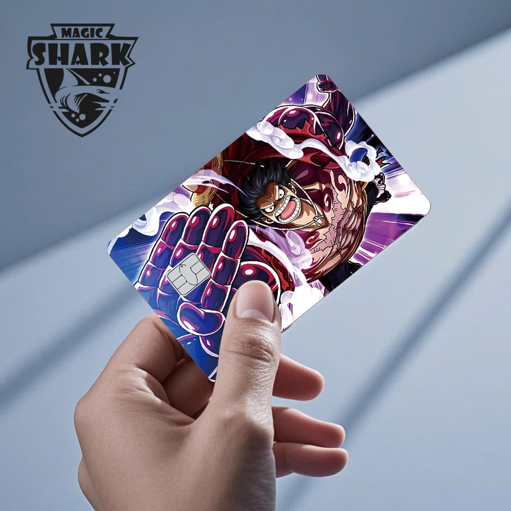 A hand holds an anime card skin featuring a smiling character with purple arms against a blue and white background.