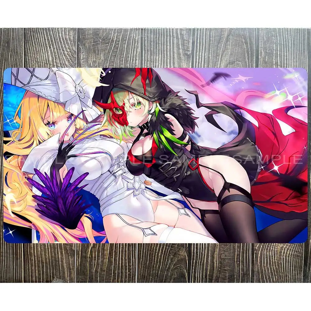 A Yu-Gi-Oh playmat features two anime women. One has blonde hair and white clothing; the other has green hair and a black outfit.