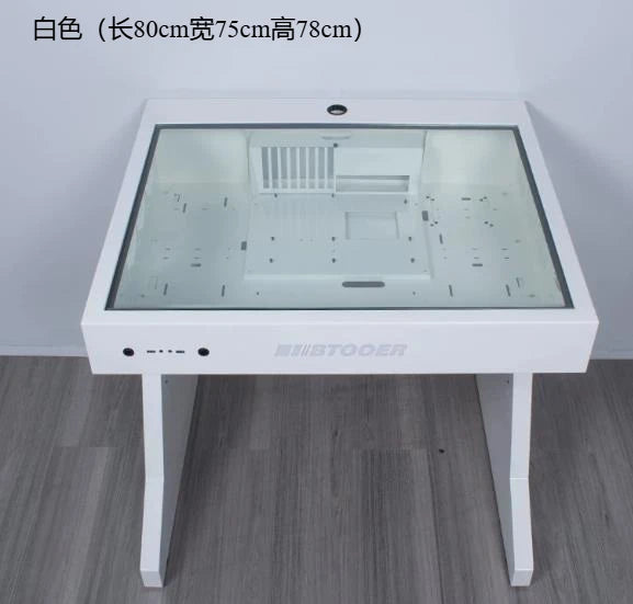 A white computer chassis desk features a glass top, internal mounting brackets, and front ports.