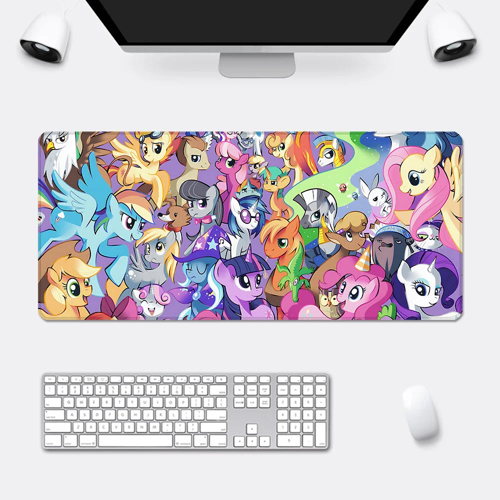 Large My Little Pony mousepad featuring a colorful cast of cartoon characters on a purple background.