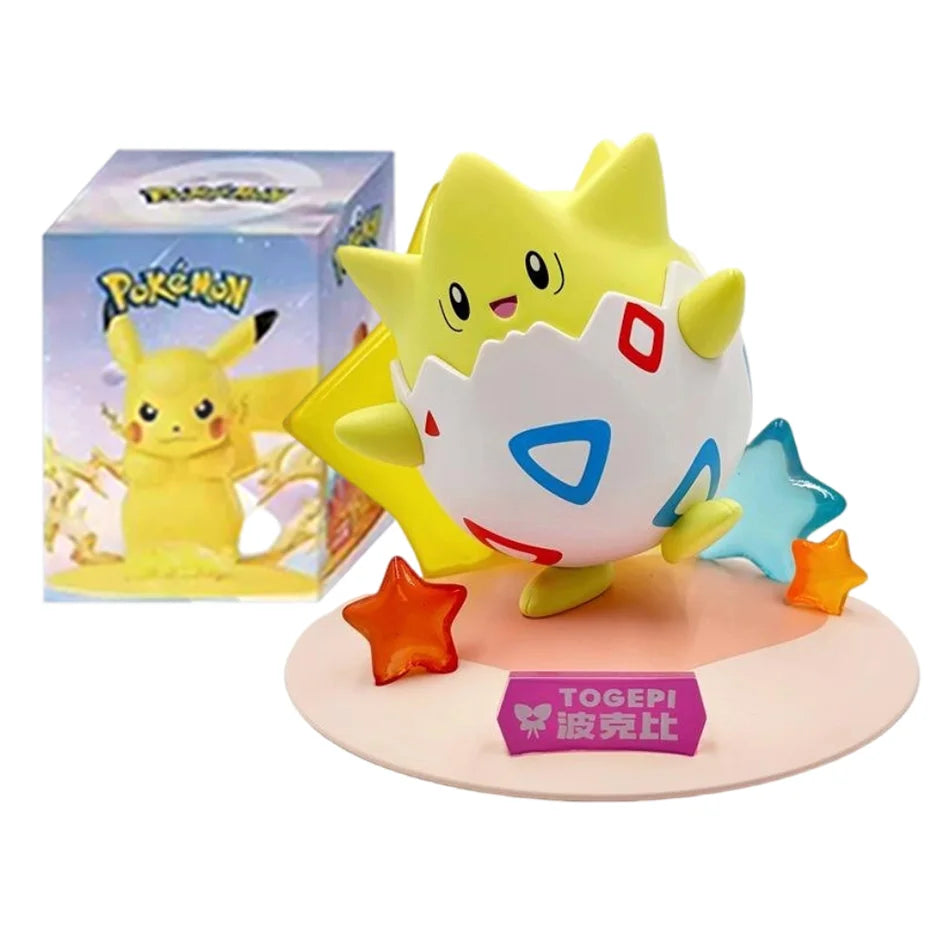 Togepi action figure emerging from a white-and-red patterned egg, standing on a pink base with translucent stars and a "TOGEPI" sign.