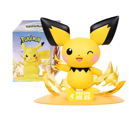 Pichu figurine with large black ears, pink cheeks, and translucent yellow electricity effects on a base.