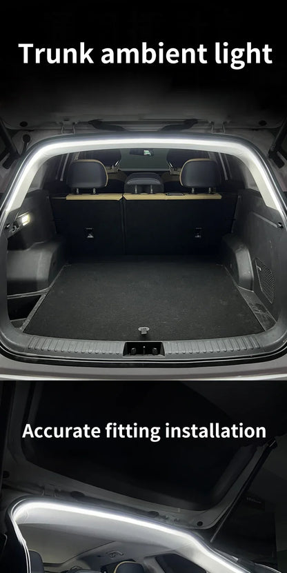 A bright white LED light strip is installed along the top edge of an open car trunk, illuminating the dark interior.