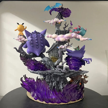 Colorful Gengar evolution figurine featuring Gengar, Gastly, and Haunter on a spooky rock diorama.