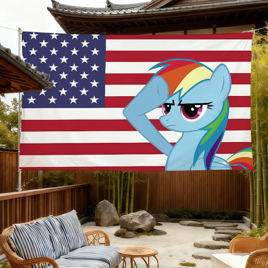 A blue pony with a rainbow mane salutes in front of an American flag banner outdoors.