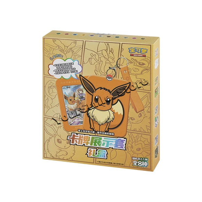 Yellow Eevee themed Pokémon card display box set with an orange keychain, card holder, and Chinese text.