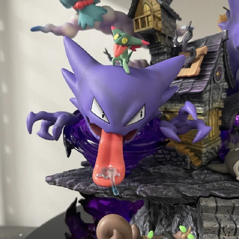 Purple Gengar figure with a long pink tongue and outstretched claws, featuring a green creature on its head.
