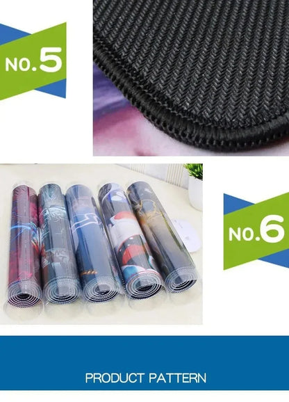 Close-up of black stitched desk mat edge, and five rolled gaming mouse pads in plastic.