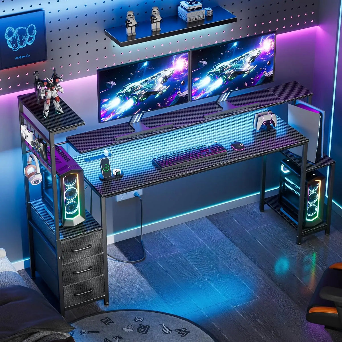 Carbon fiber-texture gaming desk with dual monitors, raised shelf, integrated drawers, shelves, and blue LED lighting.