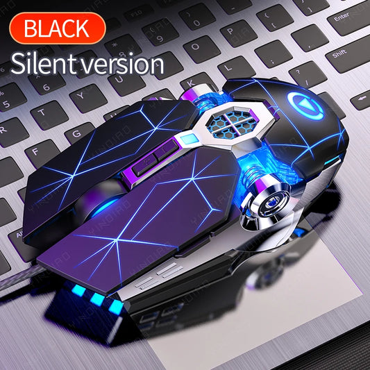 Black ergonomic gaming mouse with blue glowing geometric lines and chrome accents, resting on a laptop keyboard.