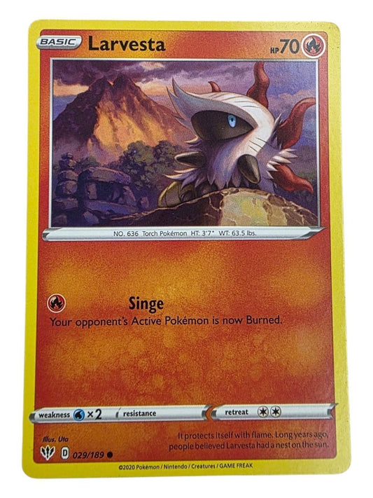Larvesta 029/189 Pokémon card from Darkness Ablaze, featuring the Fire-type bug Pokémon before a volcano.