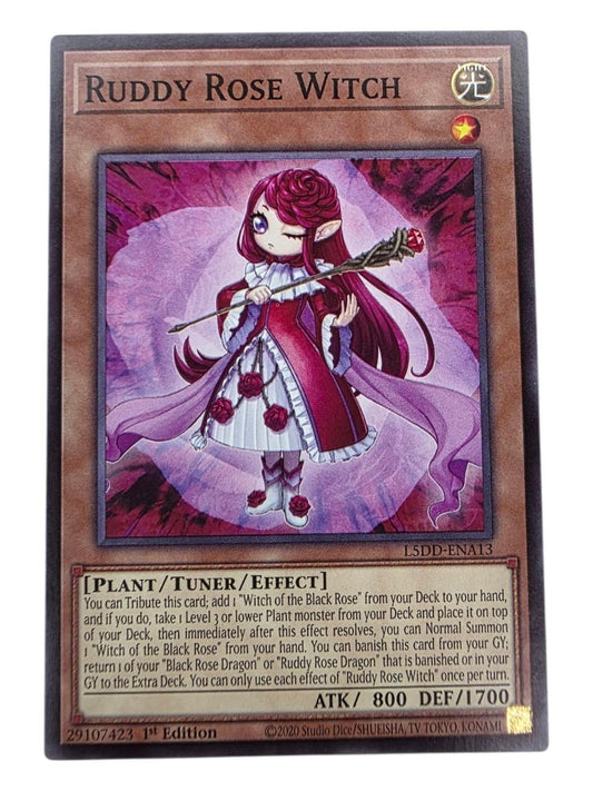 Ruddy Rose Witch 1st Edition trading card featuring a pink-haired female character holding a staff.