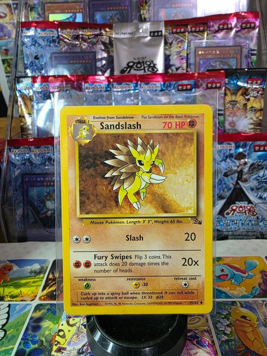 Sandslash Pokémon card in a protective sleeve with a yellow border and game stats.