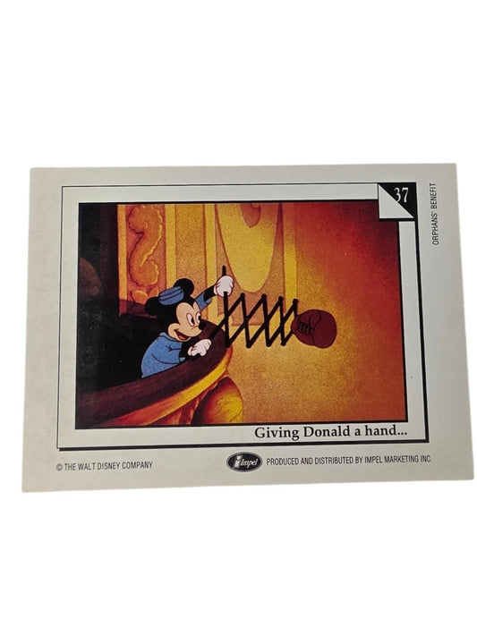 Mickey Mouse card 37, "Giving Donald a hand...", features Mickey holding an expanding boxing glove toy.