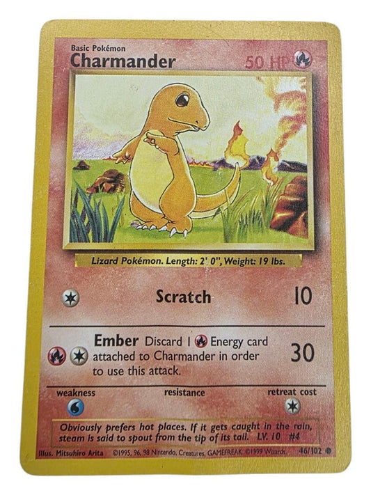 Charmander Legendary Collection trading card featuring artwork of the orange lizard Pokémon in a field.