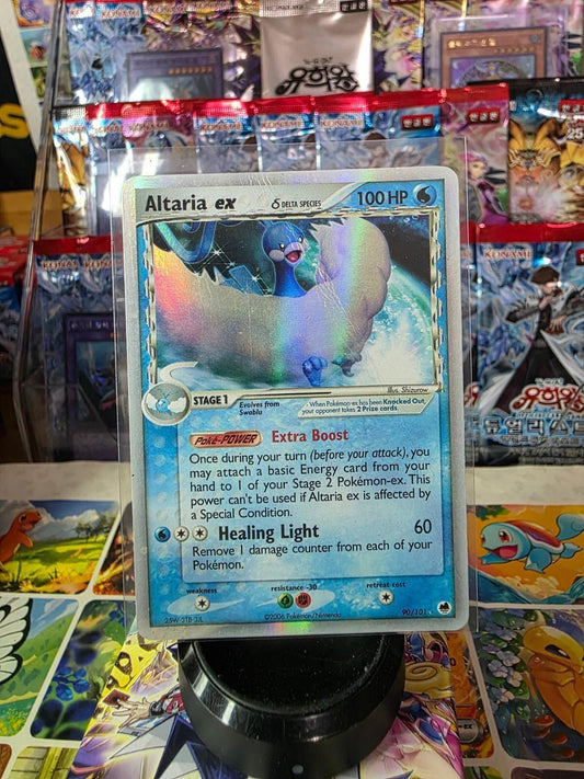 Holo Altaria ex Delta Species trading card in protective sleeve.