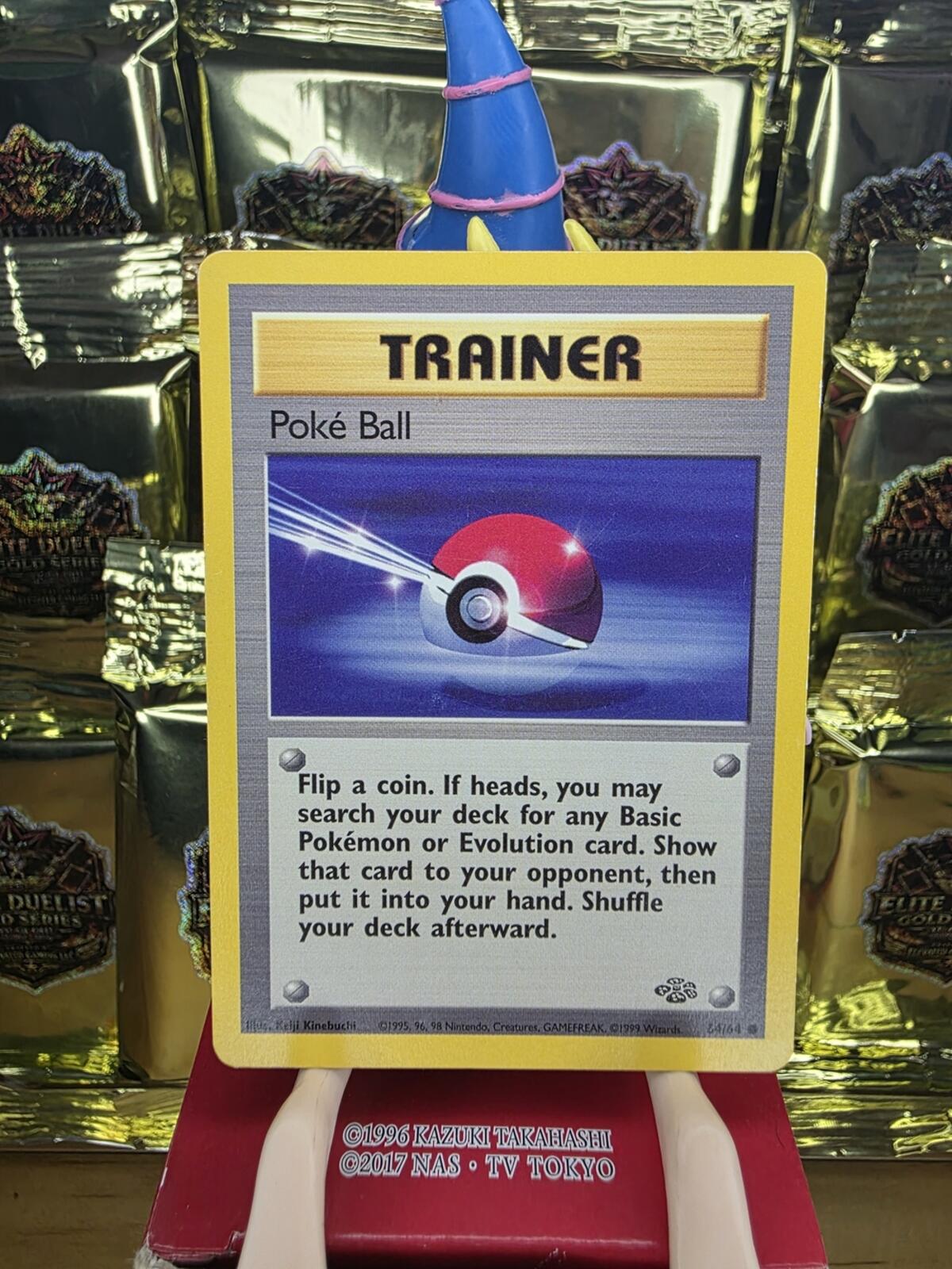 Vintage Jungle Pokémon Trainer Poké Ball Card Yellow Border with Blue and Red