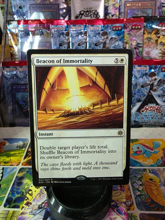 Beacon of Immortality Magic card from Explorers of Ixalan, showing light radiating inside a cave.