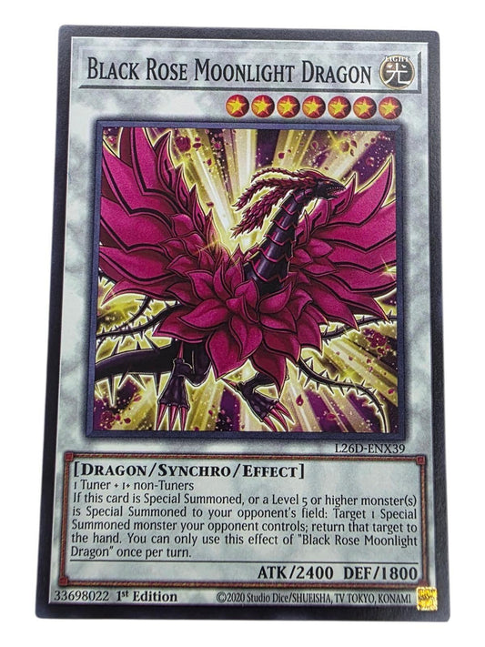 Black Rose Moonlight Dragon Yu-Gi-Oh! card showing a pink and black dragon monster.