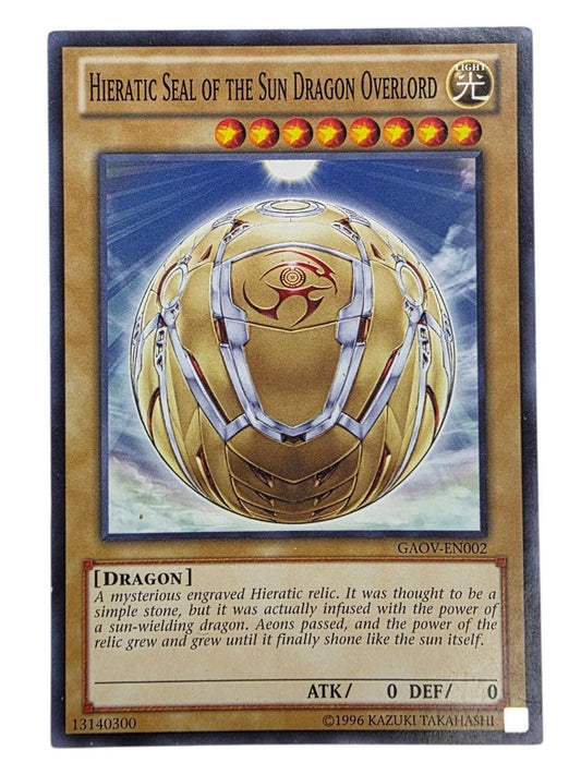 Hieratic Seal of the Sun Dragon Overlord Yu-Gi-Oh! card showing a golden spherical relic.