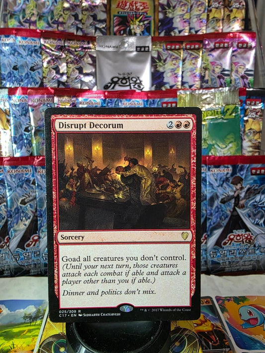 Disrupt Decorum red Magic card with a banquet scene illustration, set against a background of foil packs.