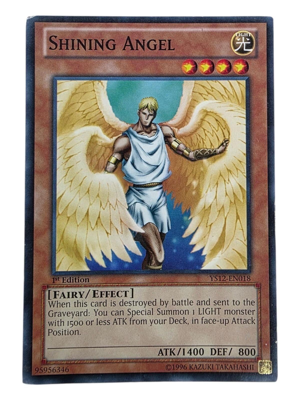 Shining Angel 1st Edition Yu-Gi-Oh! card showing a winged angelic figure.