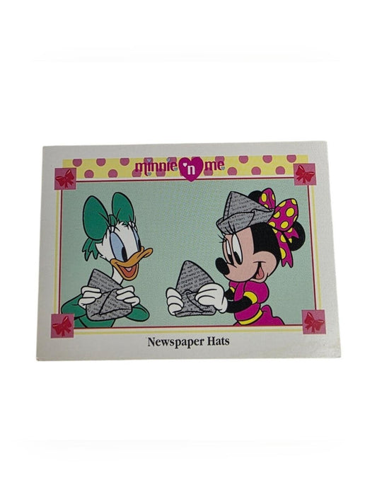 1991 Disney Minnie 'n Me "Newspaper Hats" trading card featuring Daisy Duck and Minnie Mouse.