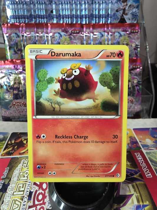 Darumaka Basic Fire Pokémon card in red and yellow, featuring the round character jumping among cacti.