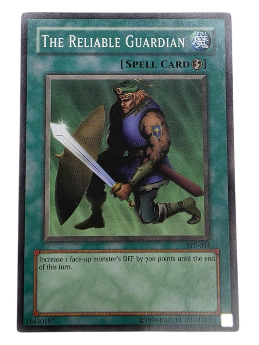 The Reliable Guardian Yu-Gi-Oh! spell card depicting a kneeling warrior holding a sword and shield.
