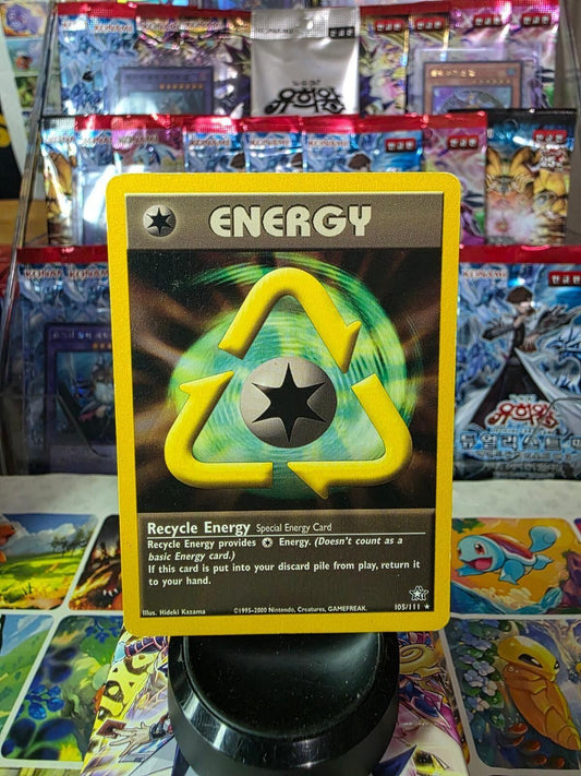 Recycle Energy 105/111 Neo Genesis Pokémon card with a yellow border and a recycling symbol.