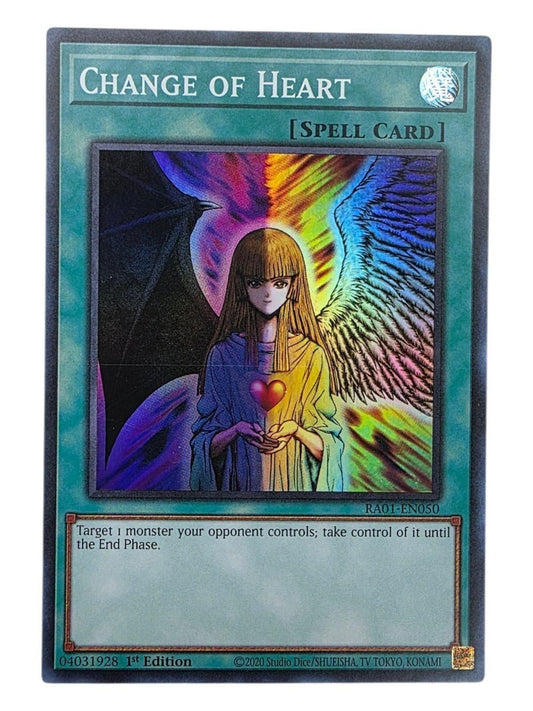 Change of Heart 1st Edition Yu-Gi-Oh! spell card featuring a figure with one angel wing and one devil wing.